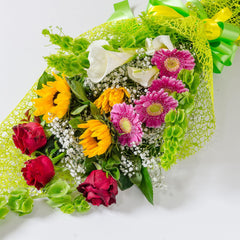 TRUST - Calla lilies, roses, sunflowers and gerberas in a bundle