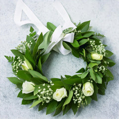 SUCCESS - Laurel wreath with white roses and gypsophila